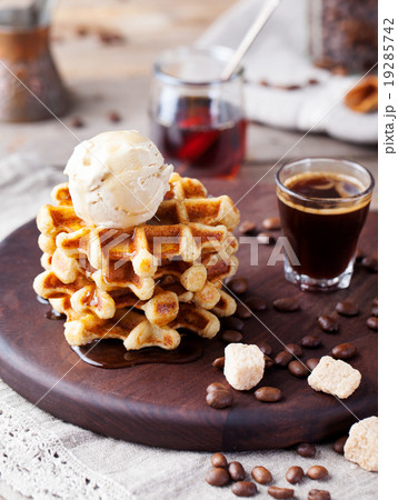 Fresh whole wheat waffles, ice cream, maple syrup Fresh whole wheat waffles, ice cream, maple syrup 19285742