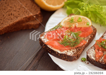 Sandwich with salmon for breakfast Sandwich with salmon for breakfast 19286094
