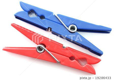 close up of a clothes pegs on white background 19286433