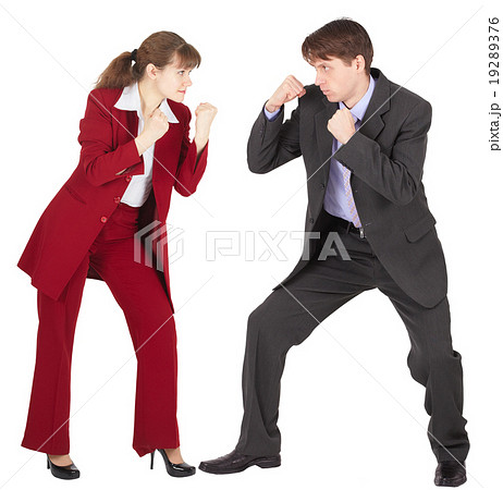 Man and woman in business suits are going to fight 19289376