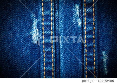 Vintage Blue torn denim jeans texture. 19290406