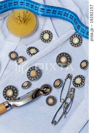 Buttons, pins, needles, measuring tape. Needlework 19292157