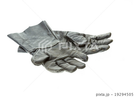 Old black work glove isolated on white Old black work glove isolated on white 19294505