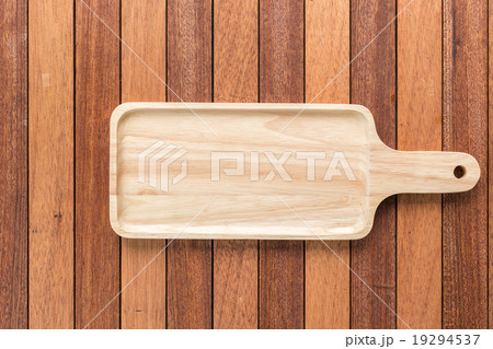 Empty wooden tray on wooden table Empty wooden tray on wooden table 19294537