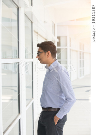 indian business male checking properties indian business male checking properties 19311287