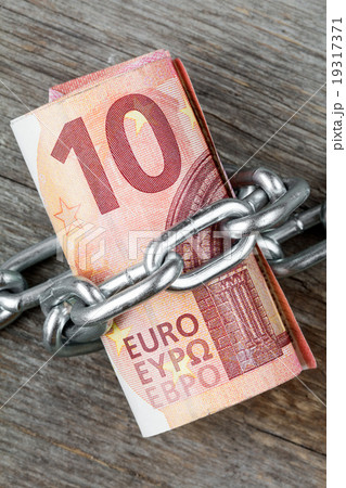 Ten euro bills with chain Ten euro bills with chain 19317371