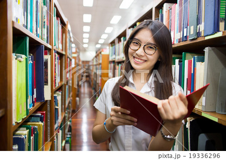 Asian student in library Asian student in library 19336296