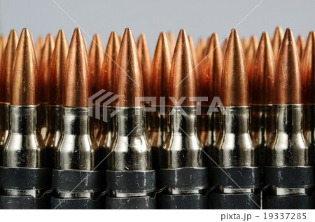 chain of bullets over white, horizontal chain of bullets over white, horizontal 19337285