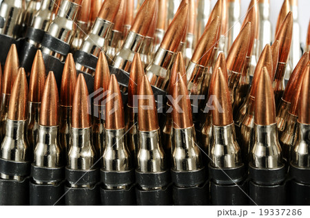 chain of bullets over white, close-up 19337286