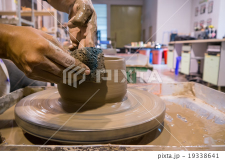 Asian clay potter Asian clay potter 19338641
