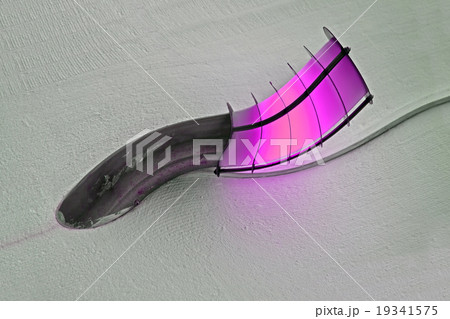 violet lamp on the wall, energy details. violet lamp on the wall, energy details. 19341575