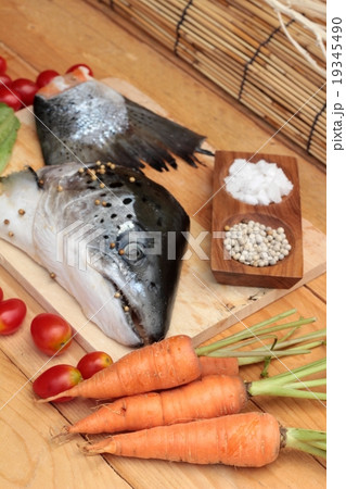 Salmon head and salmon tailfin for cooking. Salmon head and salmon tailfin for cooking. 19345490