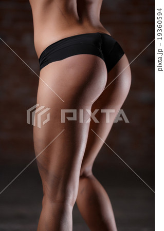 Beautiful athletic buttocks close-up 19360594
