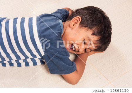 little boy laughing on the floor little boy laughing on the floor 19361130
