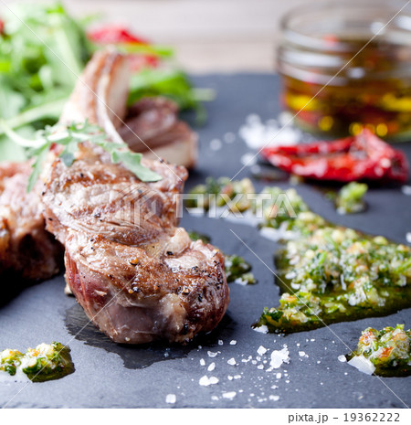 Grilled meat, mutton, lamb rack with fresh salad. 19362222