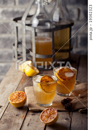Lemonade in glasses and bottles Cider 19362323