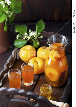 Apricot and cinnamon homemade liquor 19362326