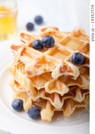 Fresh waffles with blueberries, maple syrup 19362556