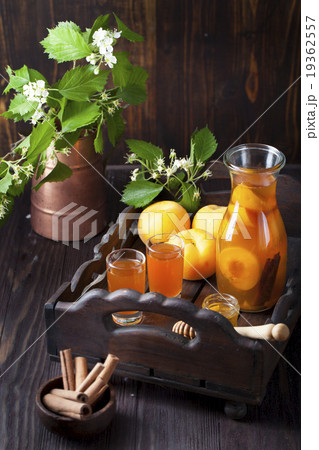 Apricot and cinnamon homemade liquor Apricot and cinnamon homemade liquor 19362557