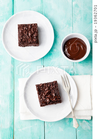 Chocolate brownie, cake, white plate Chocolate brownie, cake, white plate 19362701