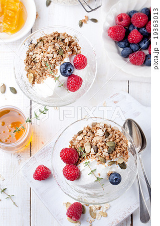 Healthy breakfast Granola with honey, yogurt Healthy breakfast Granola with honey, yogurt 19363013