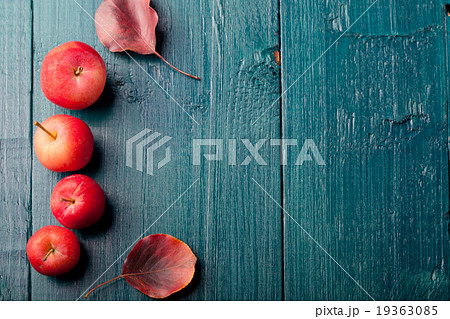 Red apples and leaves Wooden blue 19363085