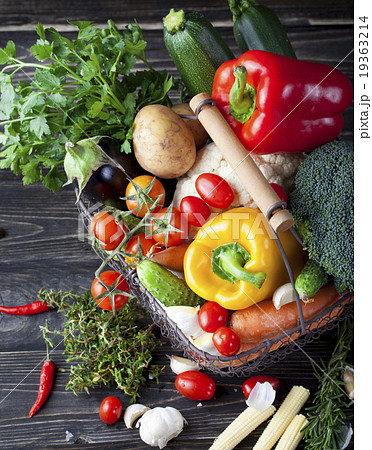 Vegetables variety in a wire basket Vegetables variety in a wire basket 19363214
