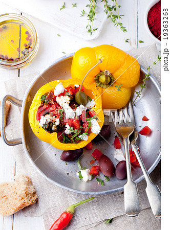 Baked stuffed bell peppers filled with cheese 19363263
