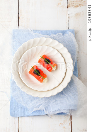 Smoked salmon rolls cream cheese, black caviar 19363341