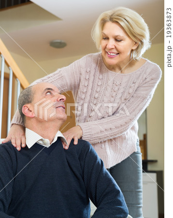 Senior couple making a back massage 19363873