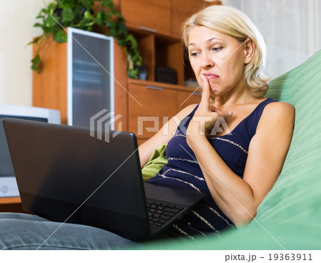 Elderly woman watching soap show 19363911