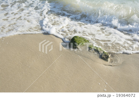 Waves Game on Stone in Beach at Tide Time 19364072