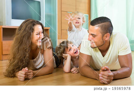 Family of four at home 19365978