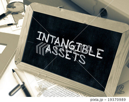 Handwritten Intangible Assets on a Chalkboard. Handwritten Intangible Assets on a Chalkboard. 19370989