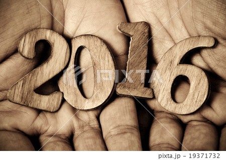 number 2016, the new year, in the hands of a man number 2016, the new year, in the hands of a man 19371732