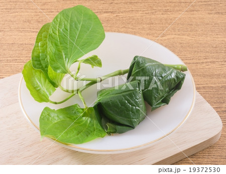Betel Leaf Wrapped Bite Size Appetizer on A Dish 19372530