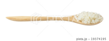 Uncooked Japanese Rice in A Wooden Spoon Uncooked Japanese Rice in A Wooden Spoon 19374195