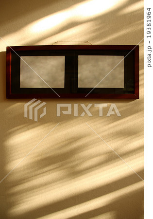 Wooden photo frame on wall 19381964