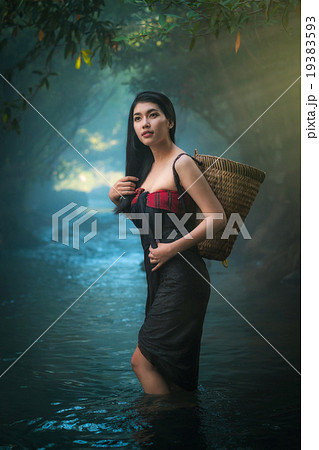 Sexy Asian women standing in creek. Sexy Asian women standing in creek. 19383593