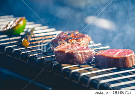 Delicious steak on grill Delicious steak on grill 19386715
