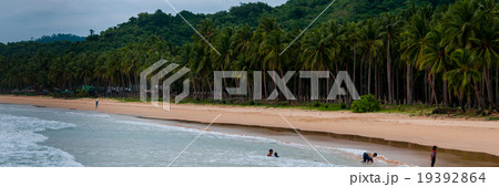 Children Playing and Swimming at the beach full of 19392864