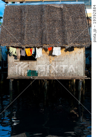 Small Nipa wooden House with close hanging out the Small Nipa wooden House with close hanging out the 19392884