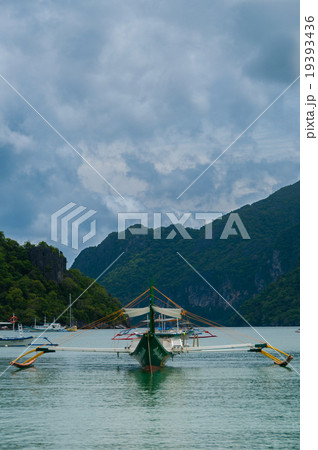 Traditional Filipino boat on Calm sea water in Traditional Filipino boat on Calm sea water in 19393436
