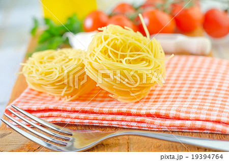 raw pasta and tomato 19394764