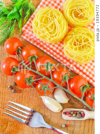 raw pasta and tomato raw pasta and tomato 19394772
