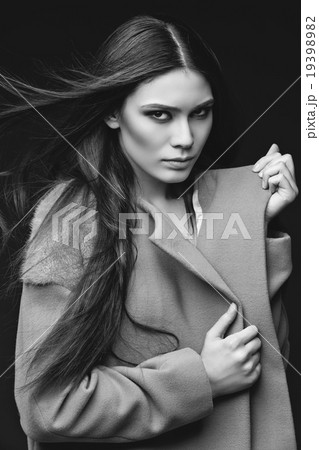 Woman in fashionable coat 19398982