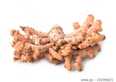 Turmeric root on white background Turmeric root on white background 19399825