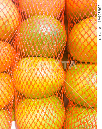 Fresh oranges in Mesh bag close up Fresh oranges in Mesh bag close up 19403962
