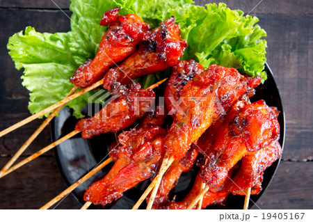 Grilled chicken stick, Thai traditional cooking Grilled chicken stick, Thai traditional cooking 19405167