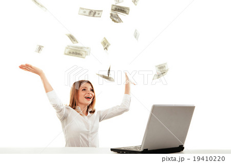Young woman with laptop and flying money. Isolated Young woman with laptop and flying money. Isolated 19410220